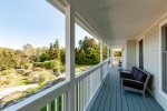 Front deck with views of the water and lovely cascading gardens